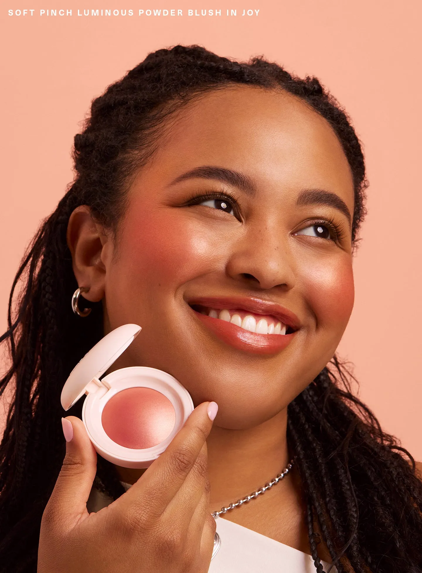 CAMPAIGN-CANDIDS-SOFT-PINCH-LUMINOUS-POWDER-BLUSH-JOY.webp