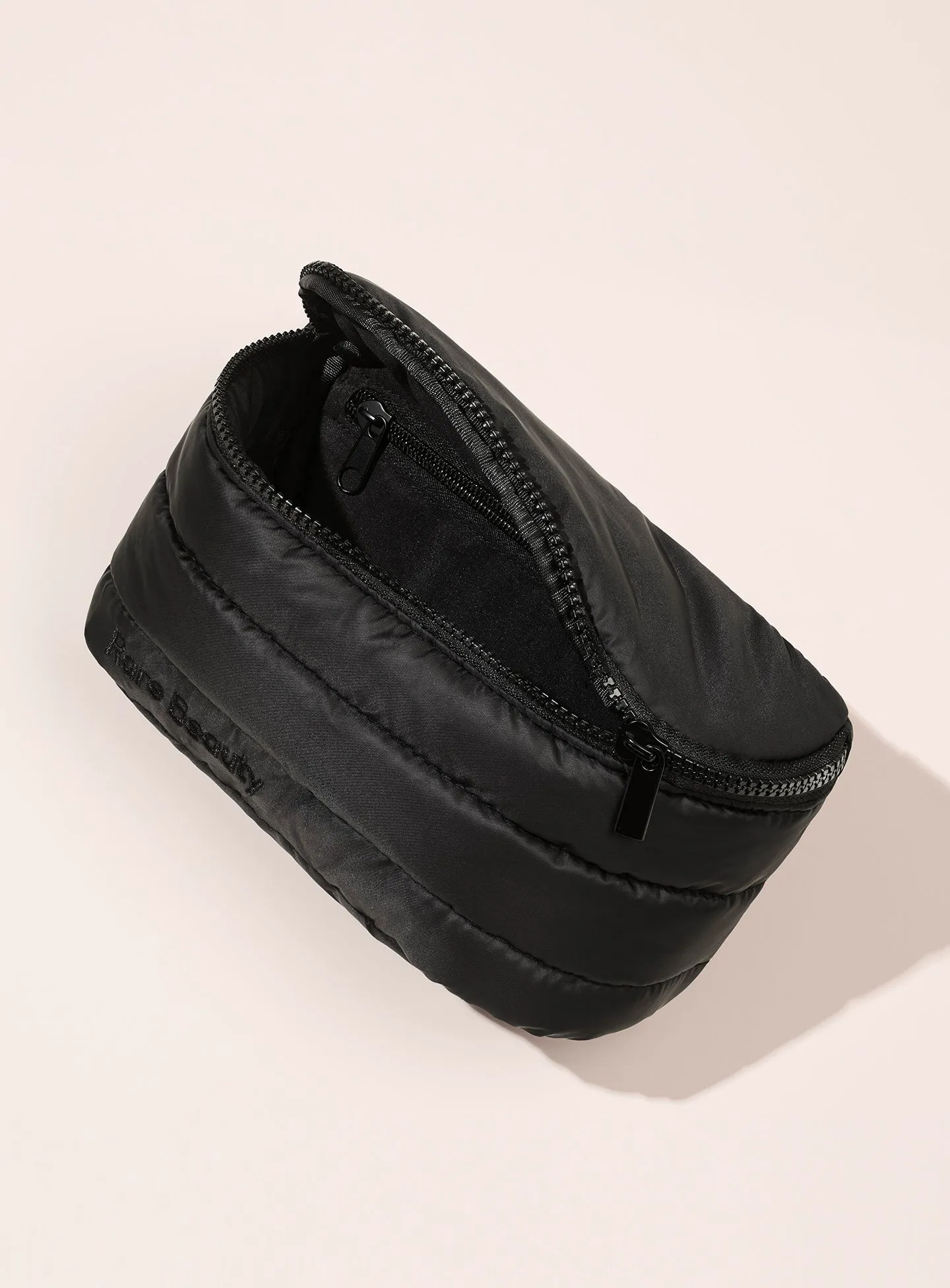 ECOMM-PUFFY-BELT-BAG-OPEN.webp