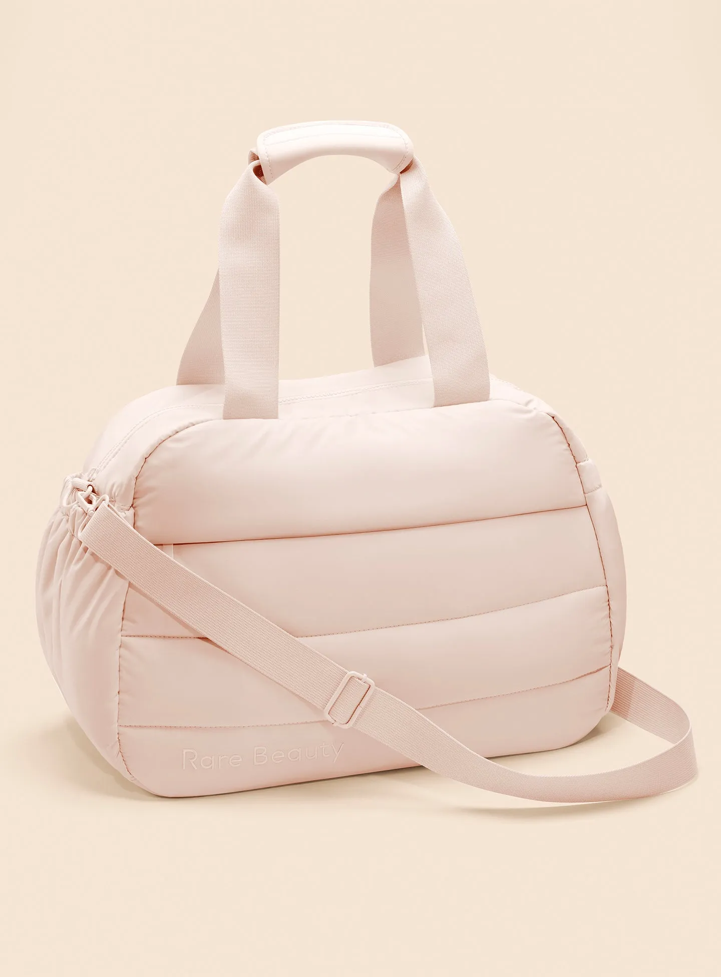 ECOMM-PUFFY-CARRYALL-TOTE-PEACH-01.webp
