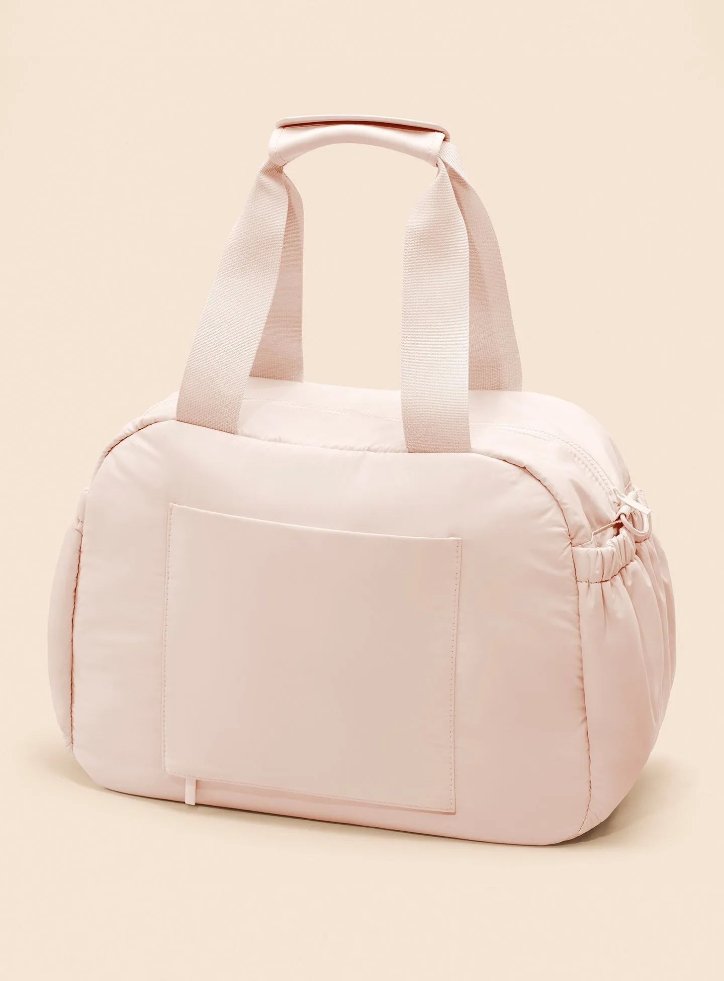 ECOMM-PUFFY-CARRYALL-TOTE-PEACH-02.webp