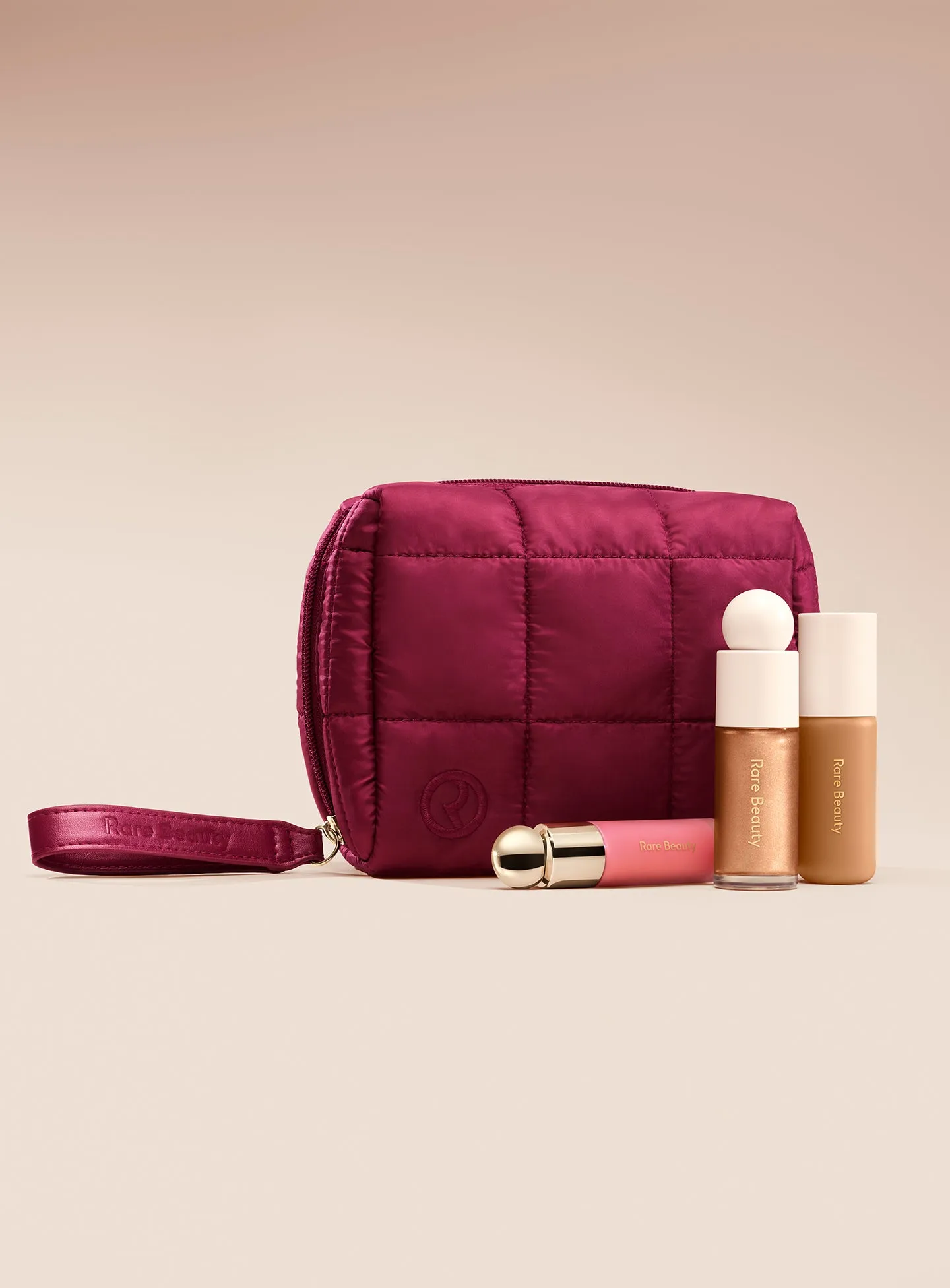 ECOMM-PUFFY-ESSENTIALS-POUCH-MERLOT-02.webp