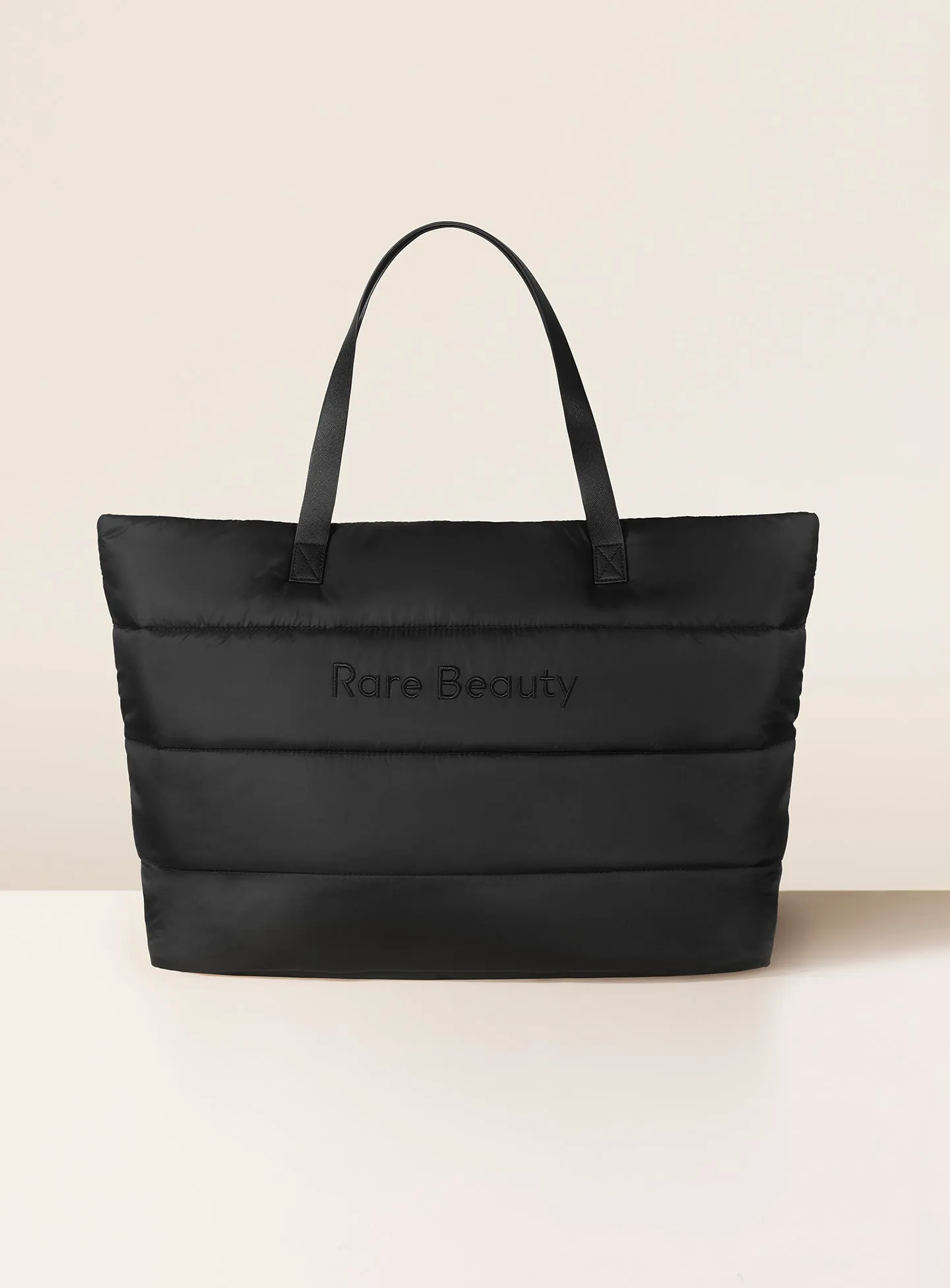 ECOMM-PUFFY-TOTE-TRAVELER-BAG-BLACK.webp