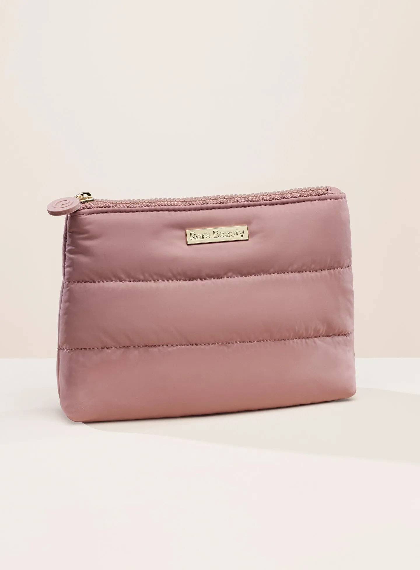 pdp-puffy-makeup-bag-mauve-front-1.webp