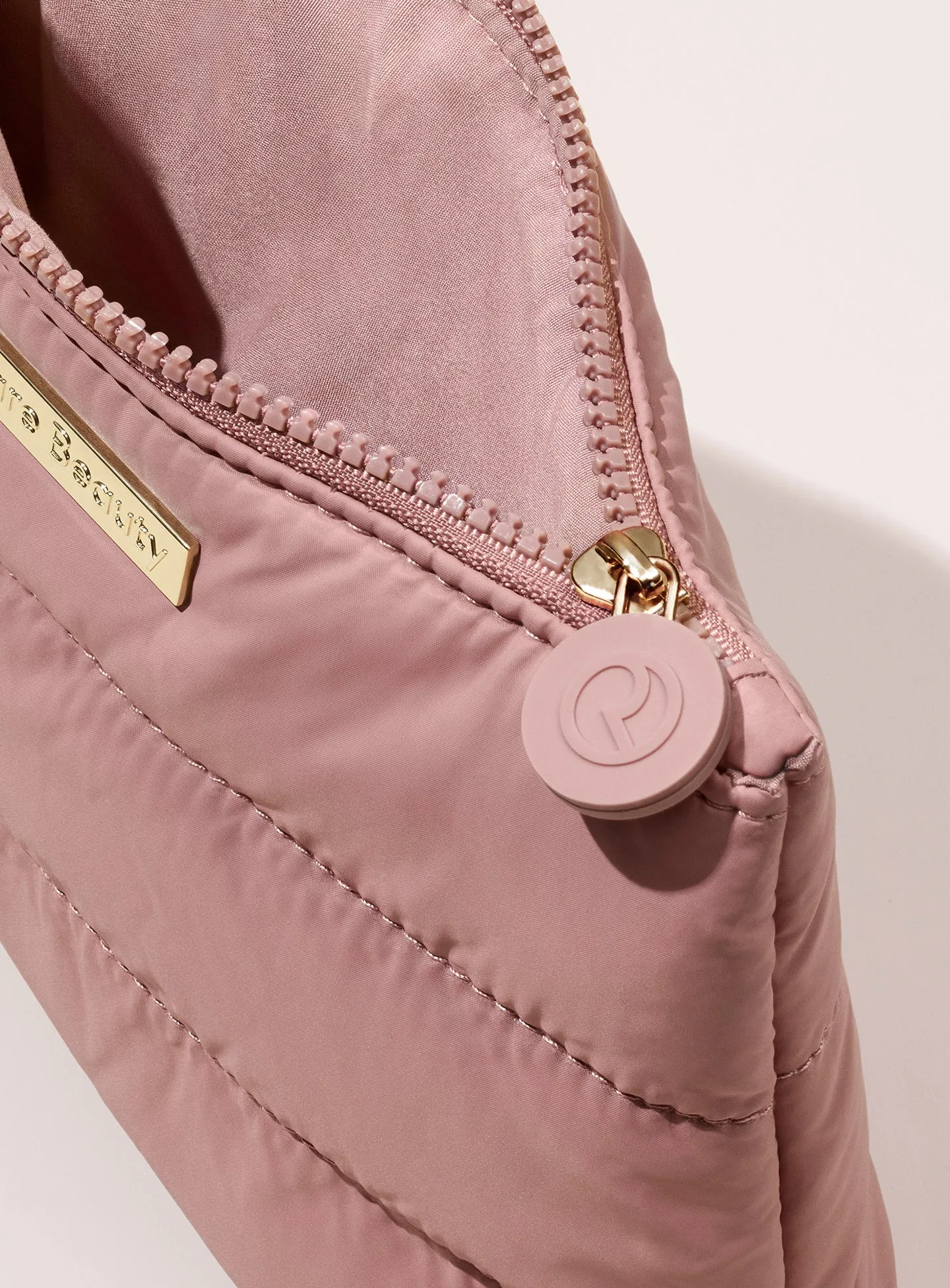 pdp-puffy-makeup-bag-mauve-top-zip-1.webp